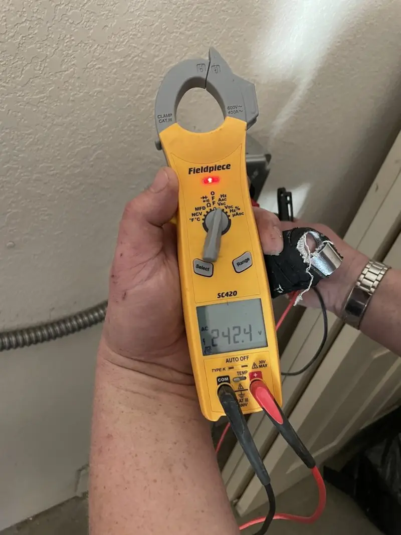 Voltage testing with clamp meter during Generator Installation in Demarest